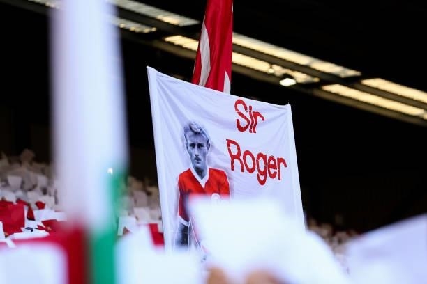 Fans in The Kop hold up a banner for the late Roger Hunt during the Premier League match between Liverpool and Manchester City at Anfield on October...