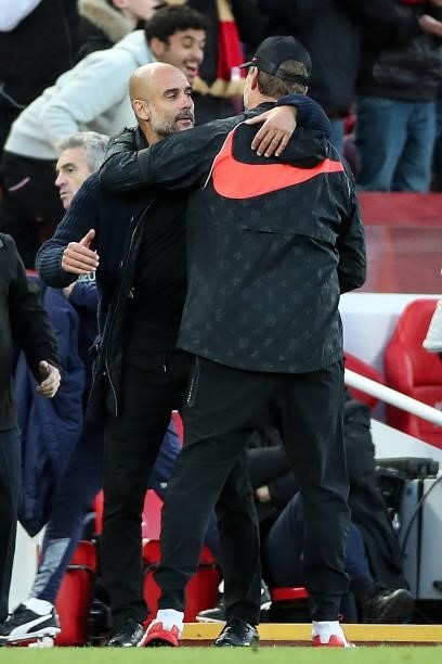 Pep Guardiola the head coach / manager of Manchester City and Jurgen Klopp the head coach / manager of Liverpool during the Premier League match...