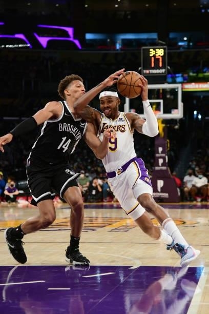 Kent Bazemore of the Los Angeles Lakers drives to the basket during the game against the Brooklyn Nets on October 3, 2021 at STAPLES Center in Los...