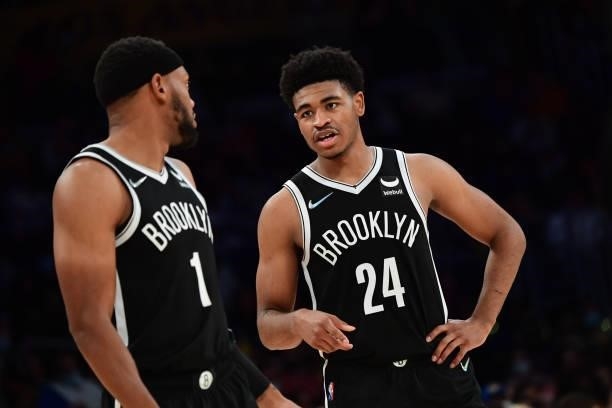 Cam Thomas of the Brooklyn Nets talks to teammate Bruce Brown during the game against the Los Angeles Lakers on October 3, 2021 at STAPLES Center in...