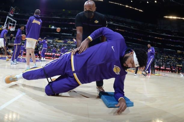 Anthony Davis of the Los Angeles Lakers stretches before the game against the Brooklyn Nets on October 3, 2021 at STAPLES Center in Los Angeles,...