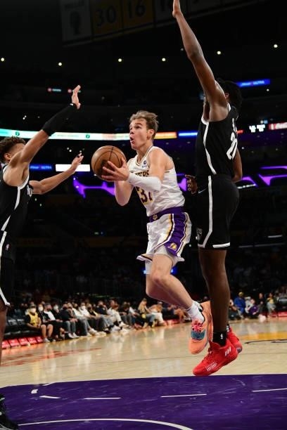 Mac McClung of the Los Angeles Lakers shoots the ball during the game against the Brooklyn Nets on October 3, 2021 at STAPLES Center in Los Angeles,...