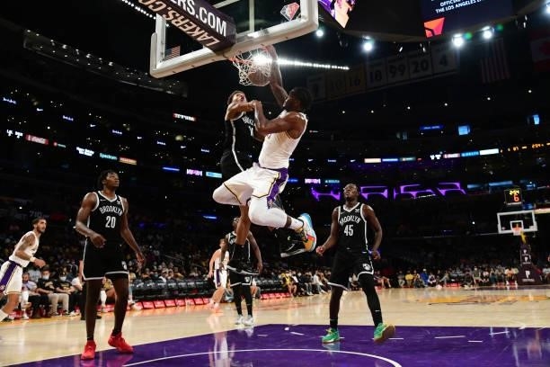 Cameron Oliver of the Los Angeles Lakers dunks the ball during the game against the Brooklyn Nets on October 3, 2021 at STAPLES Center in Los...