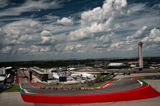 Marc Marquez of Spain leads the pack on the first turn during the Red Bull Grand Prix of the Americas - Race day at Circuit of The Americas on...