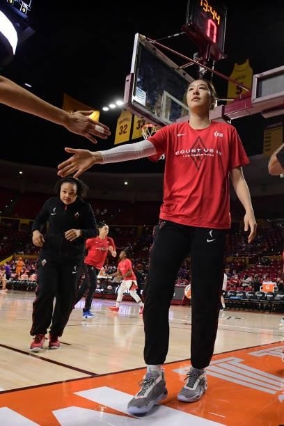 JiSu Park of the Las Vegas Aces high fives her teammate before the game against the Phoenix Mercury during Game Three of the 2021 WNBA Semifinals on...