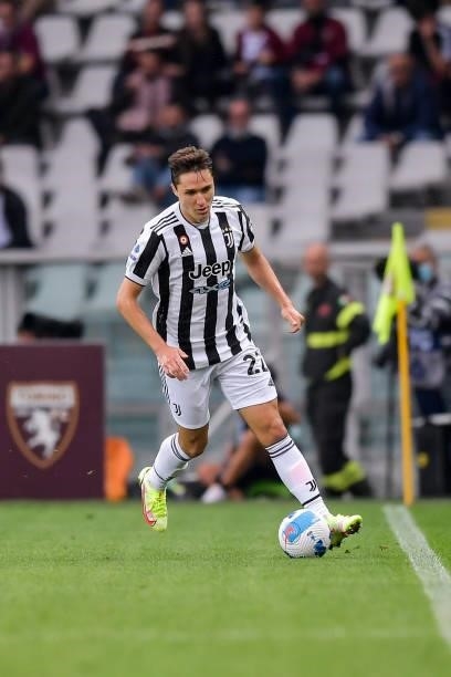 Federico Chiesa of Juventus controls the ball during the Serie A match between Torino FC v Juventus at Stadio Olimpico di Torino on October 02, 2021...