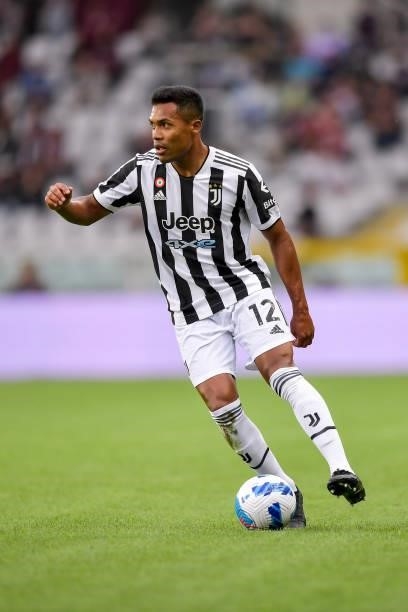 Alex Sandro of Juventus controls the ball during the Serie A match between Torino FC v Juventus at Stadio Olimpico di Torino on October 02, 2021 in...