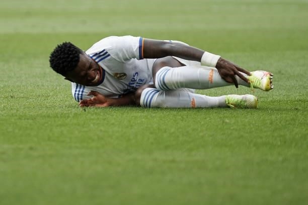 Vinicius Junior of Real Madrid lies injured on the pitch during the La Liga Santander match between RCD Espanyol and Real Madrid CF at RCDE Stadium...