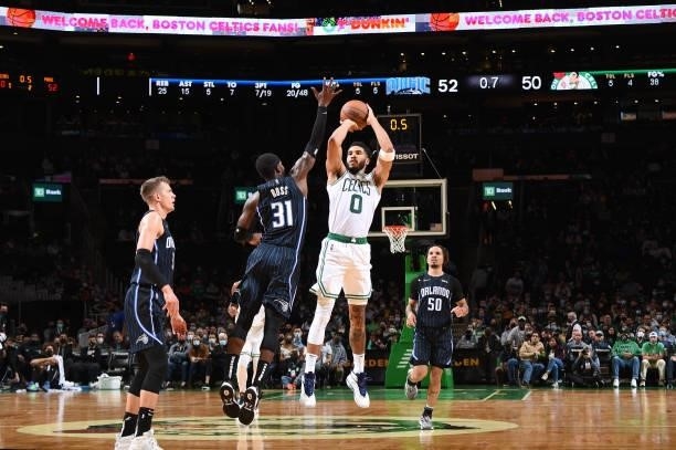 Jayson Tatum of the Boston Celtics shoots the ball during the game against the Orlando Magic on October 4, 2021 at the TD Garden in Boston,...