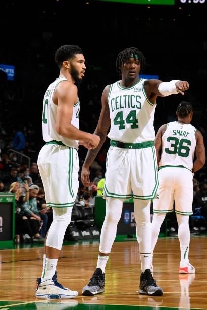 Robert Williams III talks with Jayson Tatum of the Boston Celtics during the game against the Orlando Magic on October 4, 2021 at the TD Garden in...