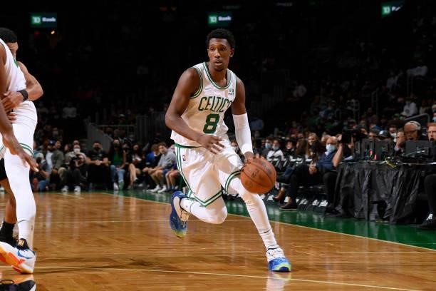 Josh Richardson of the Boston Celtics dribbles the ball during the game against the Orlando Magic on October 4, 2021 at the TD Garden in Boston,...