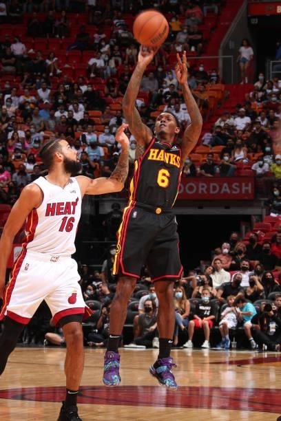 Lou Williams of the Atlanta Hawks shoots the ball during a preseason game against the Miami Heat on October 4, 2021 at FTX Arena in Miami, Florida....