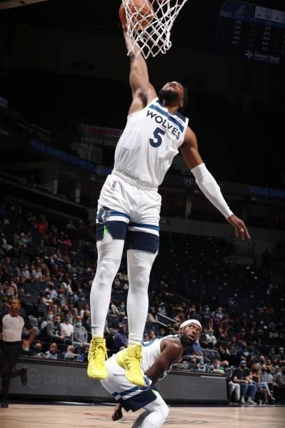 Malik Beasley of the Minnesota Timberwolves dunks the ball against the New Orleans Pelicans during a pre-season game on October 4, 2021 at Target...