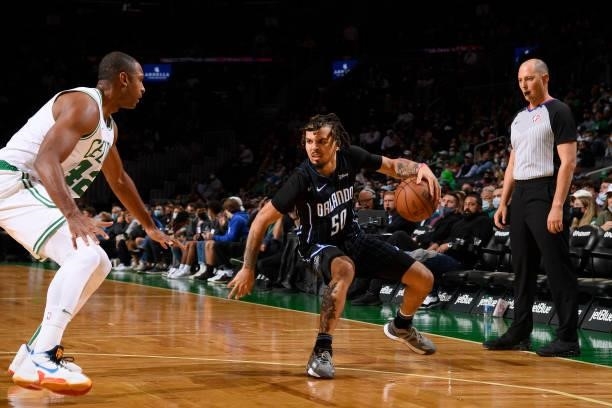 Cole Anthony of the Orlando Magic dribbles the ball during the game against the Boston Celtics on October 4, 2021 at the TD Garden in Boston,...
