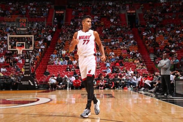 Omer Yurtseven of the Miami Heat looks on during a preseason game against the Atlanta Hawks on October 4, 2021 at FTX Arena in Miami, Florida. NOTE...