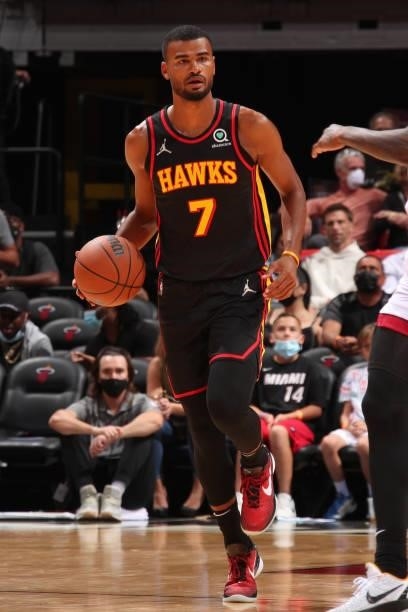 Gorgui Dieng of the Atlanta Hawks dribbles the ball during a preseason game against the Miami Heat on October 4, 2021 at FTX Arena in Miami, Florida....