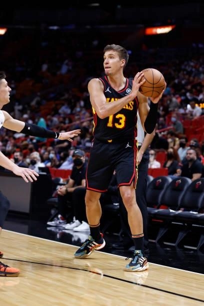 Bogdan Bogdanovic of the Atlanta Hawks handles the ball during a preseason game against the Miami Heat on October 4, 2021 at FTX Arena in Miami,...