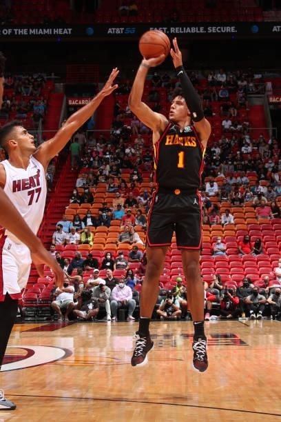 Jalen Johnson of the Atlanta Hawks shoots a three point basket during a preseason game against the Miami Heat on October 4, 2021 at FTX Arena in...