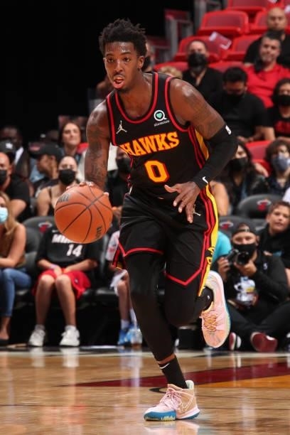 Delon Wright of the Atlanta Hawks dribbles the ball during a preseason game against the Miami Heat on October 4, 2021 at FTX Arena in Miami, Florida....