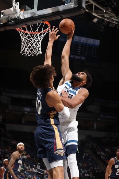 Karl-Anthony Towns of the Minnesota Timberwolves drives to the basket against the New Orleans Pelicans during a pre-season game on October 4, 2021 at...