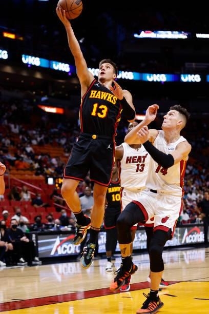 Bogdan Bogdanovic of the Atlanta Hawks shoots the ball during a preseason game against the Miami Heat on October 4, 2021 at FTX Arena in Miami,...