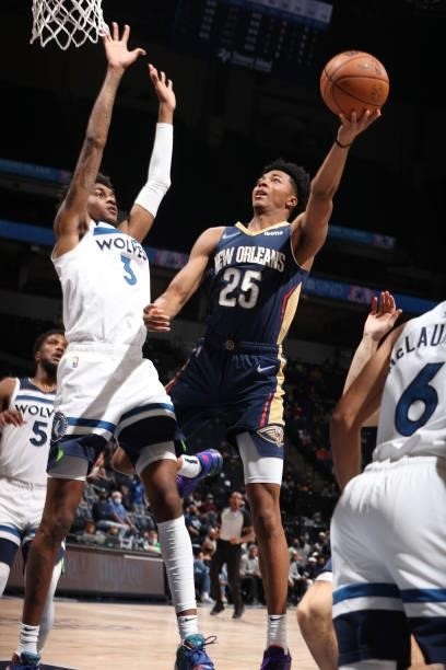 Trey Murphy III of the New Orleans Pelicans drives to the basket against the Minnesota Timberwolves during a pre-season game on October 4, 2021 at...
