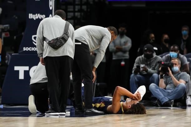 Jaxson Hayes of the New Orleans Pelicans is tended to by medical trainers in the third quarter of a preseason game. Hayes did not return against the...