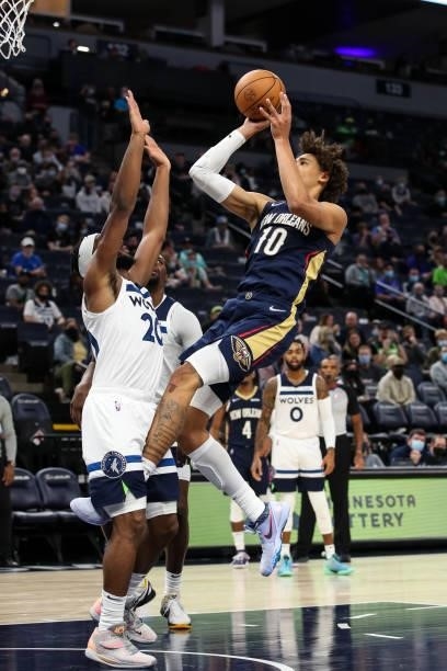 Jaxson Hayes of the New Orleans Pelicans shoots the ball while Josh Okogie of the Minnesota Timberwolves defends in the third quarter of a preseason...