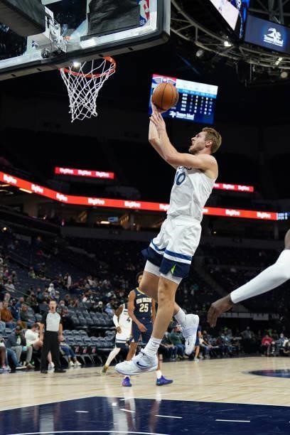 Jake Layman of the Minnesota Timberwolves shoots the ball during a preseason game against the New Orleans Pelicans on October 4, 2021 at Target...