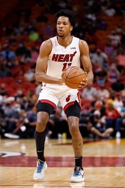 Okpala of the Miami Heat handles the ball during a preseason game against the Atlanta Hawks on October 4, 2021 at FTX Arena in Miami, Florida. NOTE...