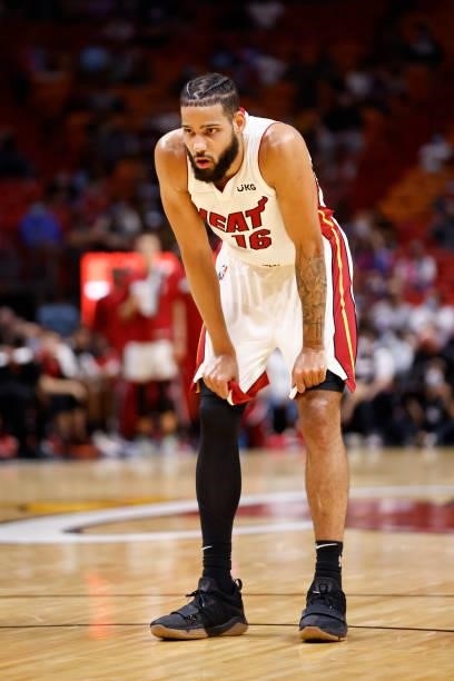 Caleb Martin of the Miami Heat looks on during a preseason game against the Atlanta Hawks on October 4, 2021 at FTX Arena in Miami, Florida. NOTE TO...