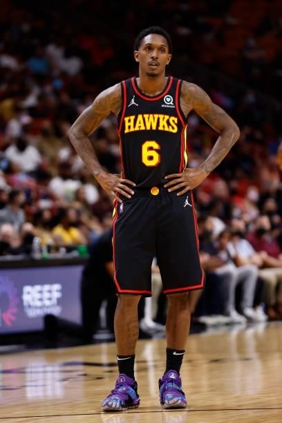 Lou Williams of the Atlanta Hawks looks on during a preseason game against the Miami Heat on October 4, 2021 at FTX Arena in Miami, Florida. NOTE TO...