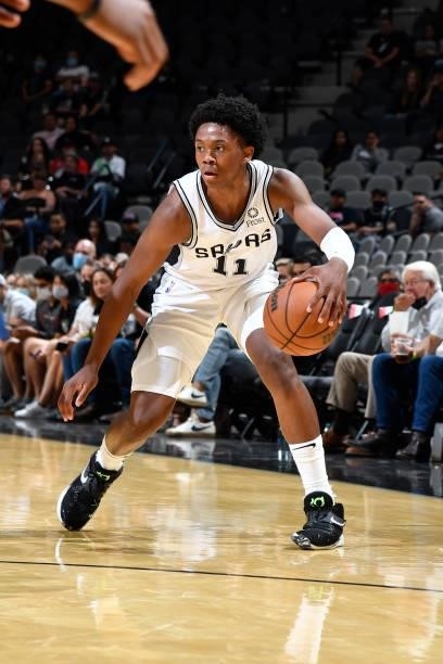 Josh Primo of the San Antonio Spurs handles the ball against the Utah Jazz during a pre-season game on October 4, 2021 at the AT&T Center in San...