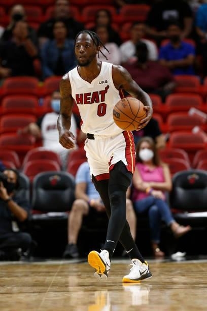Marcus Garrett of the Miami Heat dribbles the ball during a preseason game against the Atlanta Hawks on October 4, 2021 at FTX Arena in Miami,...