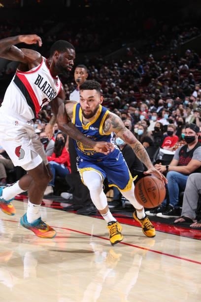 Chris Chiozza of the Golden State Warriors dribbles the ball during the game against the Portland Trail Blazers on October 4, 2021 at the Moda Center...