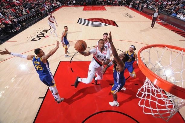 Norman Powell of the Portland Trail Blazers shoots the ball during the game against the Golden State Warriors on October 4, 2021 at the Moda Center...