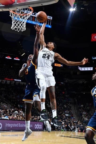 Devin Vassell of the San Antonio Spurs dunks the ball against the Utah Jazz during a pre-season game on October 4, 2021 at the AT&T Center in San...