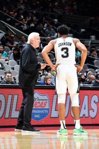 Head Coach, Gregg Popovich and Keldon Johnson of the San Antonio Spurs talk during the game against the Utah Jazz during a pre-season game on October...