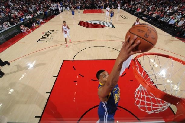 Otto Porter Jr. #32 of the Golden State Warriors dunks the ball during a preseason game against the Portland Trail Blazers on October 4, 2021 at the...