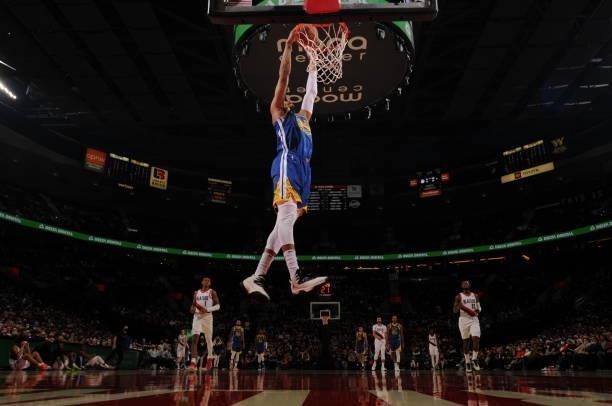 Otto Porter Jr. #32 of the Golden State Warriors dunks the ball during a preseason game against the Portland Trail Blazers on October 4, 2021 at the...