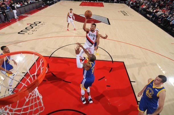 McCollum of the Portland Trail Blazers shoots the ball during a preseason game against the Golden State Warriors on October 4, 2021 at the Moda...