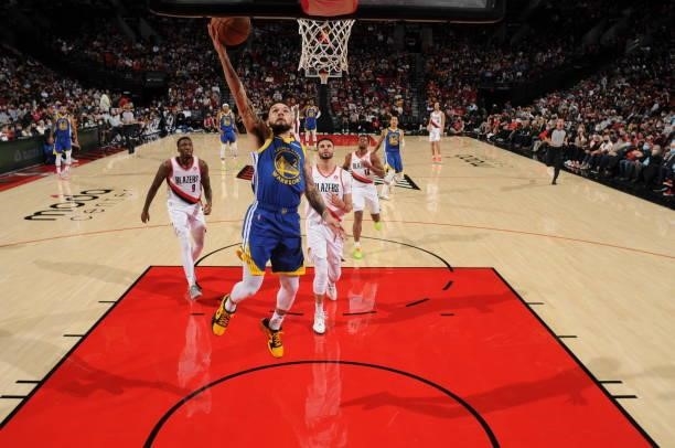 Chris Chiozza of the Golden State Warriors drives to the basket during a preseason game against the Portland Trail Blazers on October 4, 2021 at the...