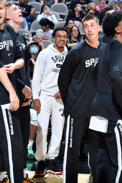 Tre Jones of the San Antonio Spurs smiles before the game against the Utah Jazz during a pre-season game on October 4, 2021 at the AT&T Center in San...