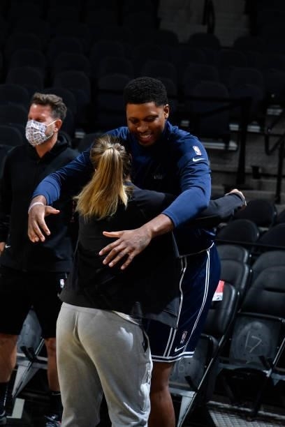 Rudy Gay of the Utah Jazz and Assistant Coach, Becky Hammon of the San Antonio Spurs hug before a pre-season game on October 4, 2021 at the AT&T...