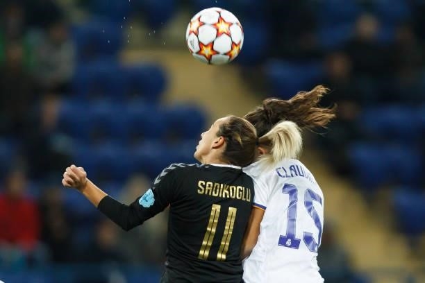 Sadikoglu of WFC Zhytlobud-1 Kharkiv and Claudia Florentino of Real Madrid battle for the ball during the UEFA Women's Champions League group B match...