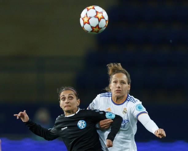 Olha Boychenko of WFC Zhytlobud-1 Kharkiv and Babett Peter of Real Madrid battle for the ball during the UEFA Women's Champions League group B match...