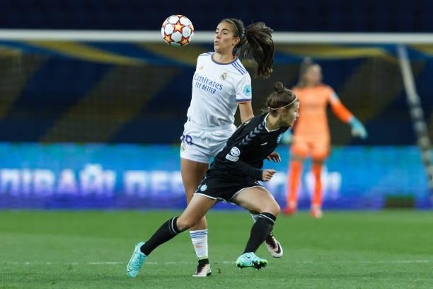 Rocio Galvez of Real Madrid and Anna Petryk of WFC Zhytlobud-1 Kharkiv battle for the ball during the UEFA Women's Champions League group B match...