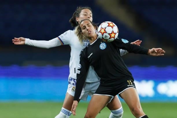 Babett Peter of Real Madrid and Sadikoglu of WFC Zhytlobud-1 Kharkiv battle for the ball during the UEFA Women's Champions League group B match...