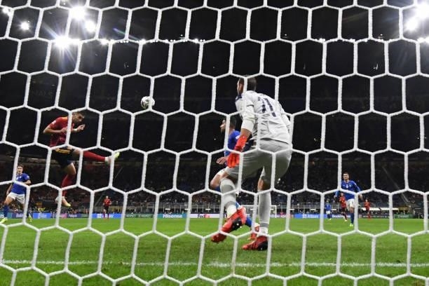 Spain's forward Ferran Torres shoots and scores a goal past Italy's goalkeeper Gianluigi Donnarumma during the UEFA Nations League semifinal football...