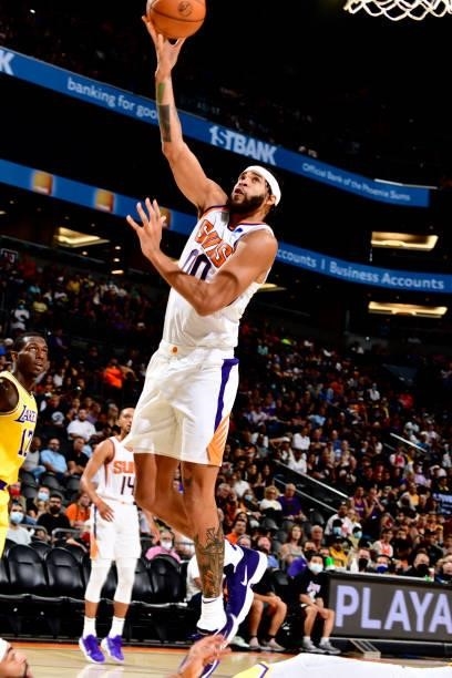 JaVale McGee of the Phoenix Suns drives to the basket against the Los Angeles Lakers during a preseason game on October 6, 2021 at Footprint Center...